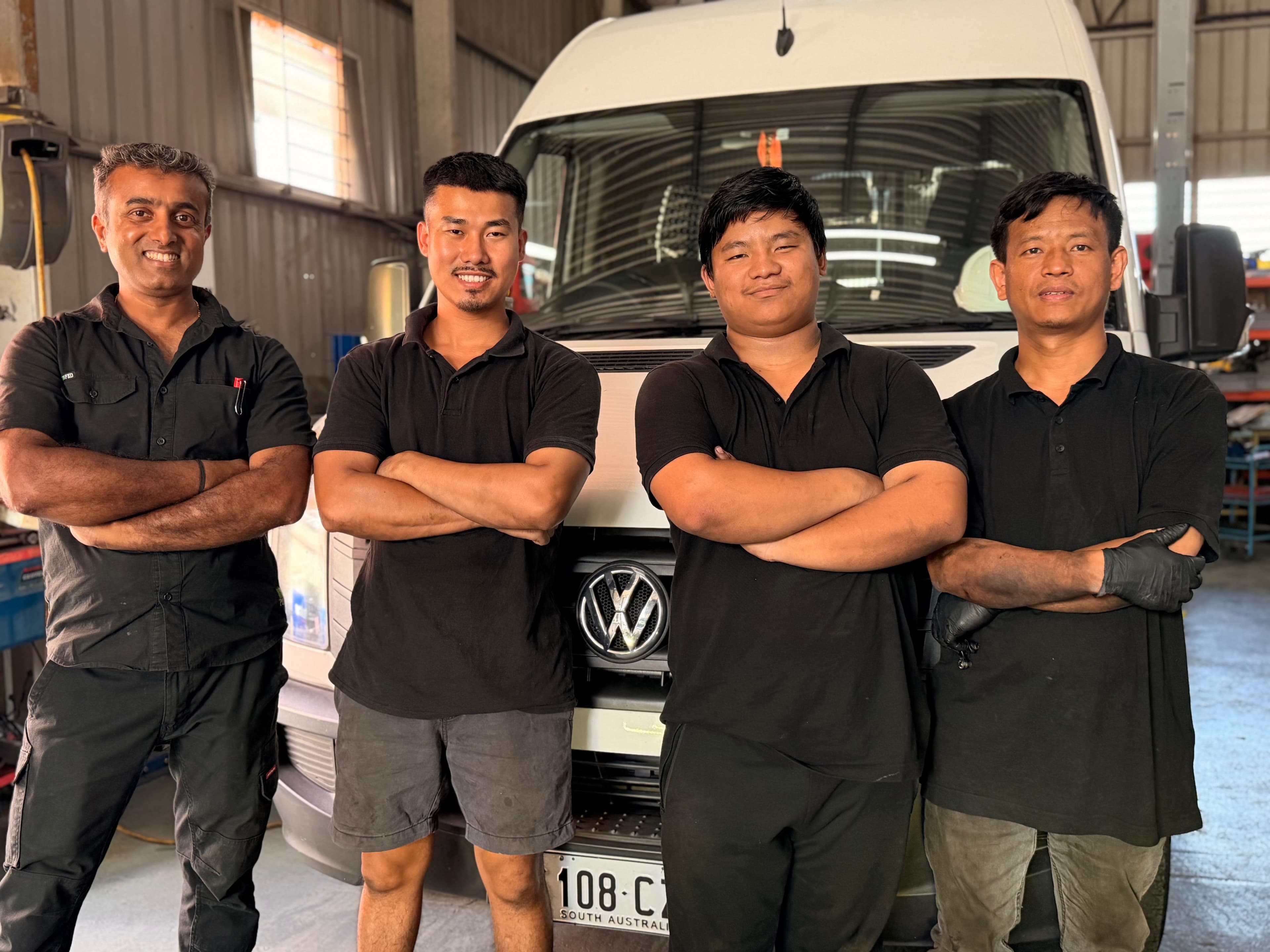 Jai's Auto Garage workshop team in the service area